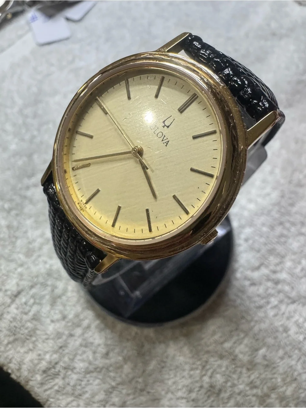 Bulova Gold Dial Men's Watch with Black Leather Strap